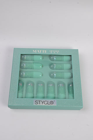 Sea green, clear pastic, matte lipstick