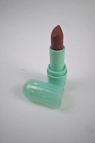 Sea green, clear pastic, matte lipstick